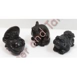 Three reproduction carved hardwood netsuke - Toads, rat and mushrooms and a kylin