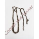 A silver watch chain of graduated solid curb links, with a T bar and swivel catch, 34.5 cm long;
