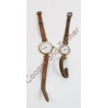 A 15 carat gold lady's mechanical wrist watch, on a strap; with a lady's 9 carat gold wrist watch on
