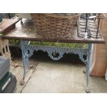 BLUE PAINTED RECTANGULAR TABLE WITH CAST IRON BASE