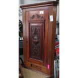 MAHOGANY CORNER CUPBOARD WITH CARVED DOOR