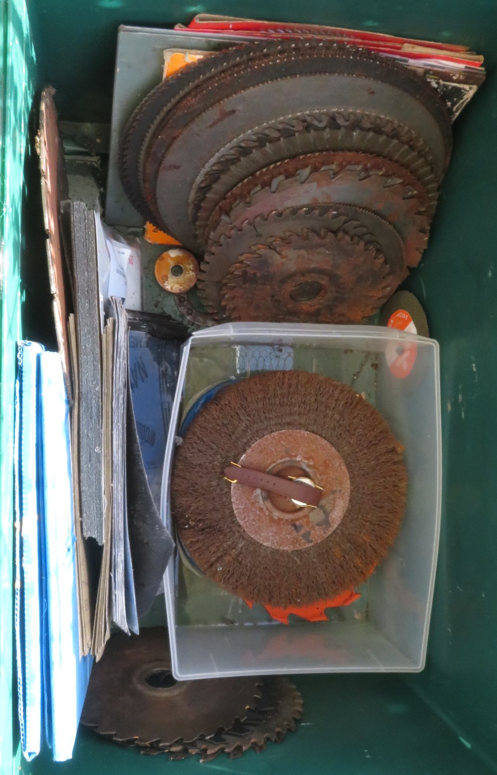 GREEN CONTAINER OF CIRCULAR SAW BLADES, SAND PAPER ETC