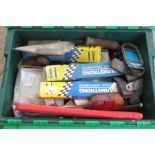 GREEN CRATE OF VARIOUS CAR PARTS INCLUDING LIGHTS, SHOCK ABSORBERS ETC