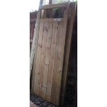 PAIR OF PINE GATES WITH METAL FINIALS