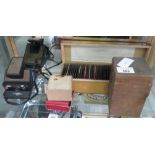 COLLECTION OF PHOTOGRAPHIC GLASS PLATES & A POLAROID CAMERA