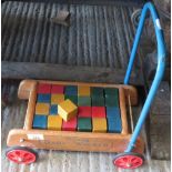 TRI-ANG BABY WALKER WITH WOODEN BLOCKS