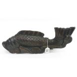 A large carved wooden carp finial, 46cms long