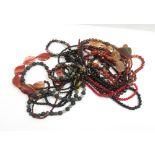 A quantity of hardstone bead necklaces to include carnelian, various agates, black onyx and lava. Of