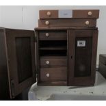 Five drawer watchmakers tool cabinet containing a large amount of tools, screwdrivers