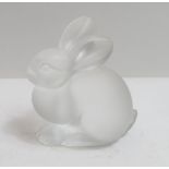 A small Lalique seated rabbit, etched marks to base, 7cms high