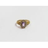 An amethyst and seed pearl 18 carat gold ring, Chester 1912, finger size M1/2, 3.2 g gross