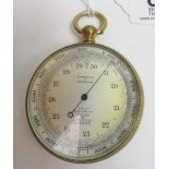 A pocket barometer by Short and Mason London having circular silvered metal dial with revolving