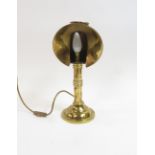 A modern brass table lamp in the form of a candle lamp 37cms high