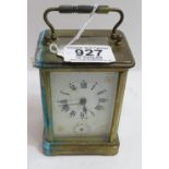 A French made carriage clock with alarm in brass case with white enamel dial and subsidiary alarm