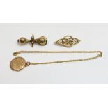 A French gold seed pearl brooch, with control marks, 4 cm long, 2.7 g gross; a small circular locket