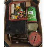 A box of assorted collectables including coins, pen knives, watercolour paint tin, pipe cleaning