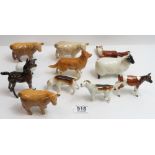 A collection of Beswick animals - Scottish black face ewe and lamb; Highland calves; hounds,