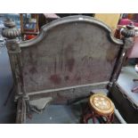 A Victorian mahogany double bed the solid head and footboards with decorative mouldings and