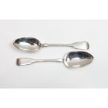 A matched pair of Victorian silver fiddle pattern table spoons, one by Aldwinkle & Slater, London