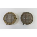 A pair of circular nautical bulkhead lights approx. 24cms diam