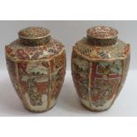 A pair of late 19th/early 20th Century Japanese Satsuma ginger jars, both with original covers and