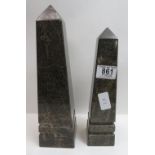 A late Victorian polished stone obelisk, 30cms high together with another similar smaller obelisk
