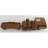 An American style wooden toy steam train and open wagon, 25cms high