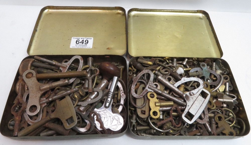 2 tins of old clock keys and winders