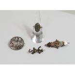 An Edwardian silver brooch; a marcasite set ring; a small paste set lizard brooch; and a metal