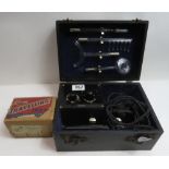 An early 20th Century electro magnetic therapy set in case and with glass attachments together