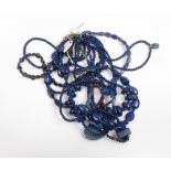 Ten Lapis lazuli and other hardstone bead necklaces with interval beads to include coral, metal