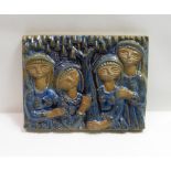 A mid century Danish wall plaque of four ladies manufactured by Michael Andersen and designed by