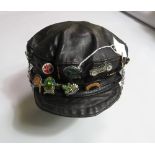 LEATHER CAP WITH BADGES