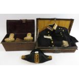 A Royal Navy dress and full dress uniform includes belt with gilt metal buckle, epaulettes, bicorn