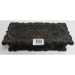 A late 19th/early 20th Century Cantonese carved wood box of rectangular form, deeply worked with