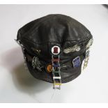 LEATHER CAP WITH BADGES