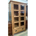 MODERN OAK DISPLAY CABINET WITH DRAWERS TO BASE