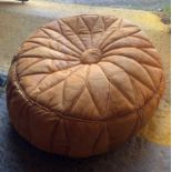 A LEATHER POUFFE