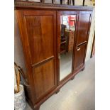 TRIPLE MAHOGANY WARDROBE WITH DECORATIVE CARVING BY MAPLE & CO