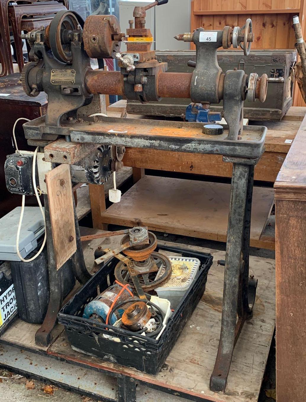 VINTAGE METAL WORK LATHE MADE BY DRUMMOND BROTHERS LTD, WITH SPARES IN CRATE