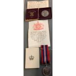 FESTIVAL OF BRITAIN 1951 COIN IN CASE ALONG WITH A 1939-1945 WAR MEDAL