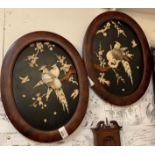 PAIR OF CHINESE RELIEF LAQUERED OVAL PLAQUES OF BIRDS