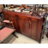 OAK SIDEBOARD WITH DETAILED DOOR PANELS