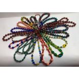 A quantity of costume jewellery bead necklaces, largely glass beads; of varying colours, designs and