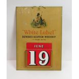 A vintage advertising calendar for “White label Dewar's Scotch Whisky”