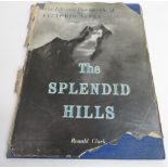 A collection of books; The Splendid Hills The Life and Photographs of Vittorio Sells by Ronald
