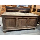 A 19th century oak three panelled coffer with candlebox and iron hinges, 105cm long, 42.5cm deep,