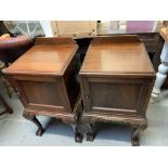 A pair of late 19th/early 20th century mahogany bedside cupboards, each with single door and on four
