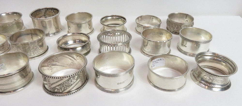 A collection of twenty one silver napkin rings, various dates and makers, 285 g (9.1 troy ozs) - Image 2 of 3