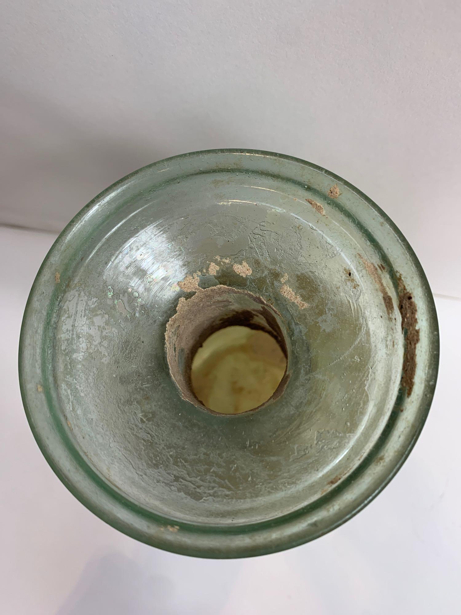 A Roman glass bottle, standing on a concave base with a green ring around the neck, probably 1st-2nd - Image 3 of 7